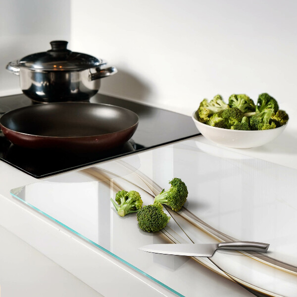 Tagliere in vetro temperato con motivo a onde astratte nei toni del beige