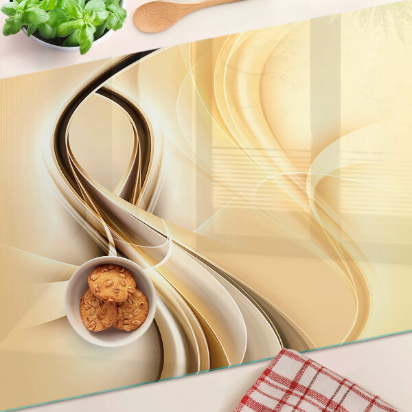 Tagliere in vetro con stampa a onde astratte nei toni del beige