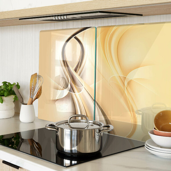 Tagliere in vetro con stampa a onde astratte nei toni del beige