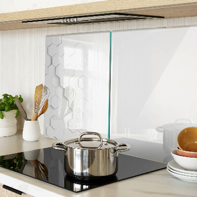 Tagliere in vetro temperato con motivo a esagoni nei toni del grigio