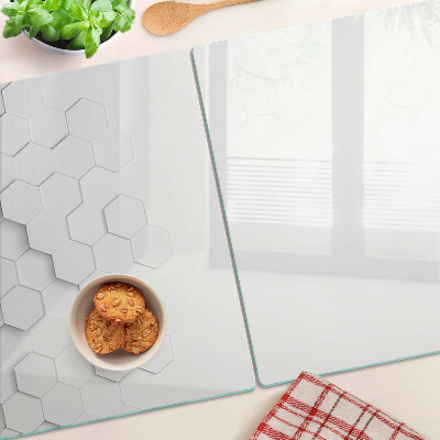 Tagliere in vetro temperato con motivo a esagoni nei toni del grigio