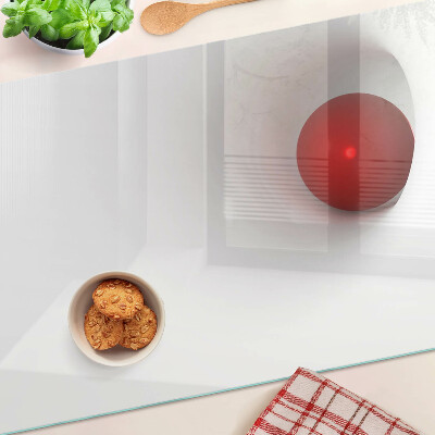 Tagliere in vetro con motivo a cerchio rosso su sfondo trasparente