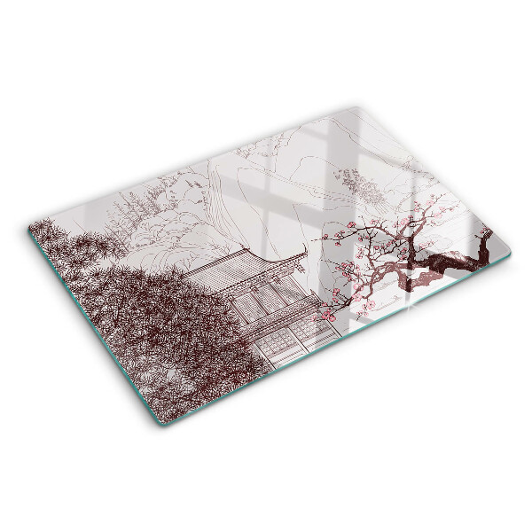 Tagliere in vetro temperato con paesaggio montano e alberi in fiore