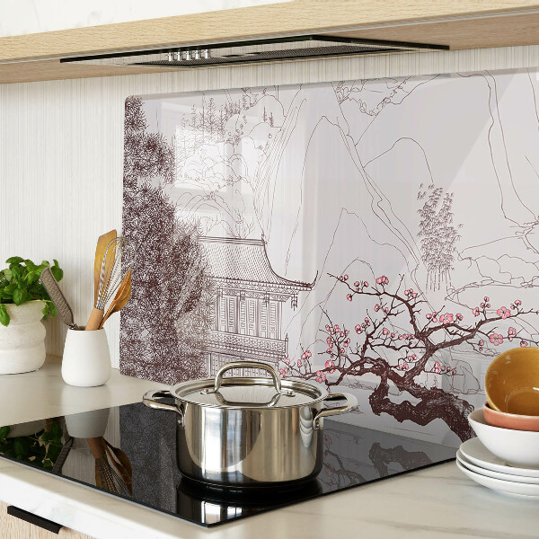 Tagliere in vetro temperato con paesaggio montano e alberi in fiore