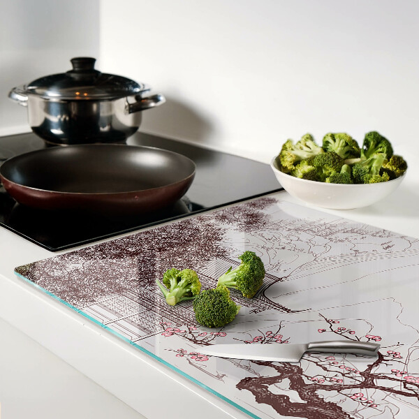 Tagliere in vetro temperato con paesaggio montano e alberi in fiore