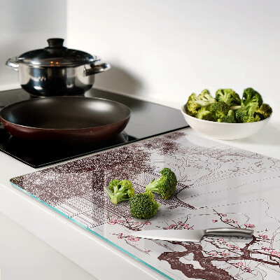 Tagliere in vetro temperato con paesaggio montano e alberi in fiore