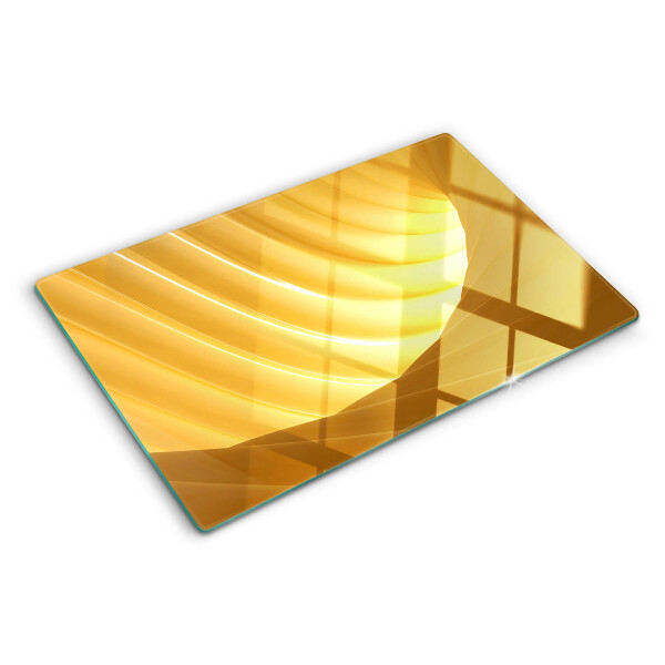 Tagliere in vetro con motivo di onde dorate e finiture a forma di finestre