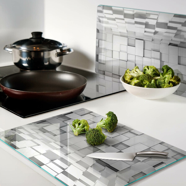 Tagliere in vetro con motivo a mosaico grigio e bianco