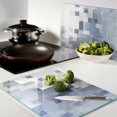 Tagliere in vetro temperato con motivi geometrici nei toni del blu