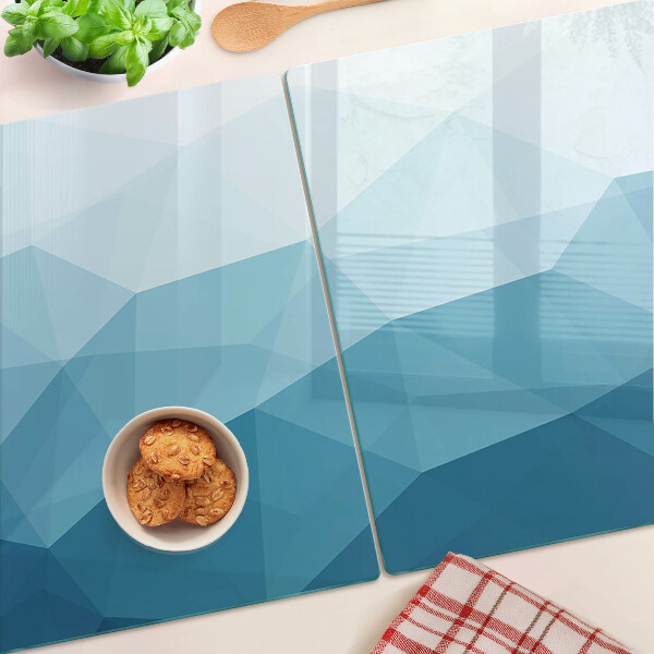 Tagliere in vetro con motivo a gradiente di triangoli blu