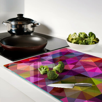 Tagliere in vetro temperato con motivo geometrico nei toni del rosa e del viola