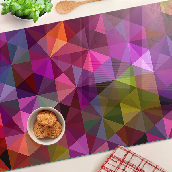 Tagliere in vetro temperato con motivo geometrico nei toni del rosa e del viola