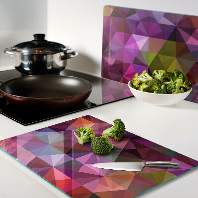 Tagliere in vetro temperato con motivo geometrico nei toni del rosa e del viola