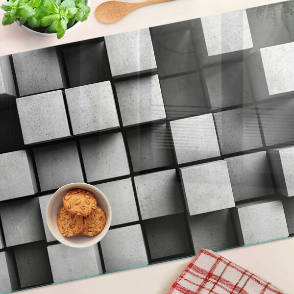 Tagliere in vetro con motivi geometrici nei toni del grigio