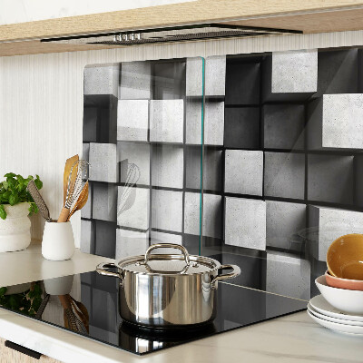 Tagliere in vetro con motivi geometrici nei toni del grigio