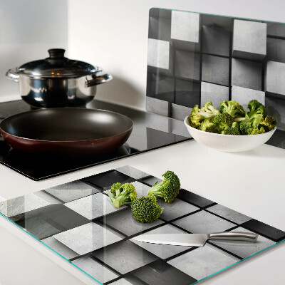 Tagliere in vetro con motivi geometrici nei toni del grigio