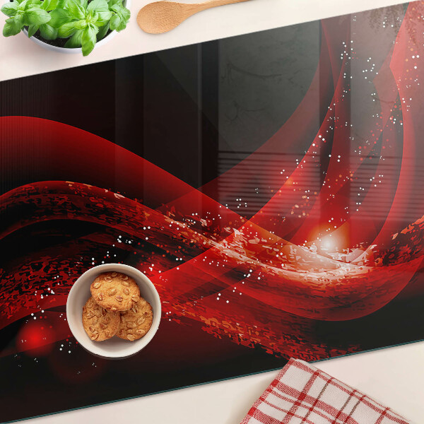 Tagliere in vetro temperato con motivo a onde rosse e effetto luminoso