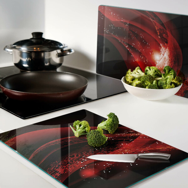 Tagliere in vetro temperato con motivo a onde rosse e effetto luminoso