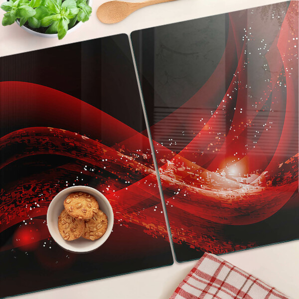 Tagliere in vetro temperato con motivo a onde rosse e effetto luminoso