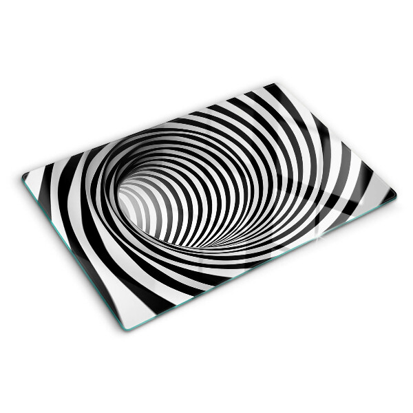 Tagliere in vetro con motivo a spirale nei toni del bianco e nero