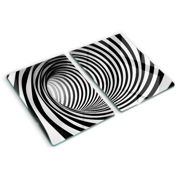 Tagliere in vetro con motivo a spirale nei toni del bianco e nero