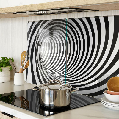 Tagliere in vetro con motivo a spirale nei toni del bianco e nero