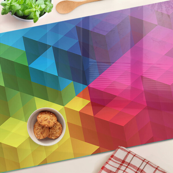 Tagliere in vetro temperato con motivo geometrico a triangoli dai colori vivaci