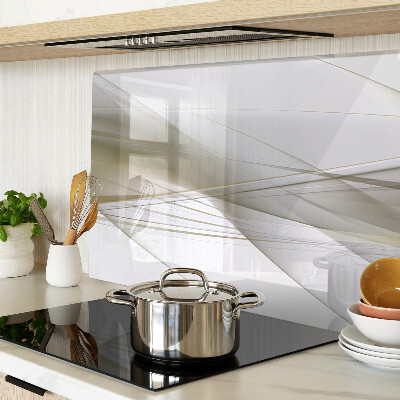 Tagliere in vetro con motivo di linee e forme astratte