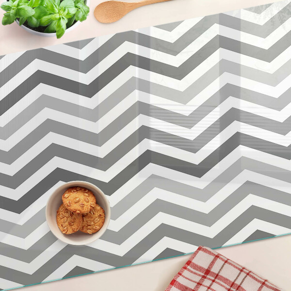 Tagliere in vetro temperato con motivo a zigzag nei toni del grigio