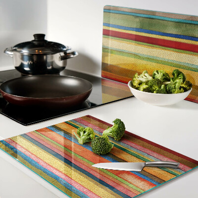 Tagliere in vetro con motivo a strisce colorate astratte