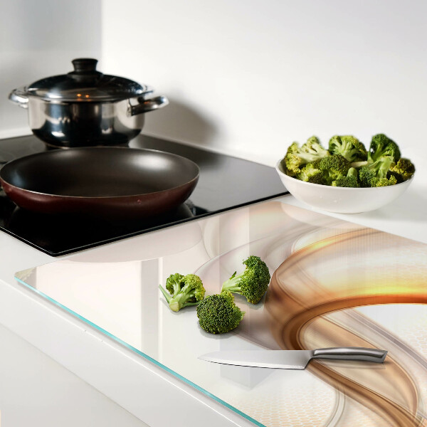 Tagliere in vetro temperato con motivi a onde in tonalità oro