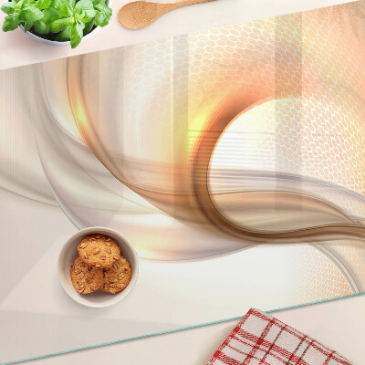 Tagliere in vetro temperato con motivi a onde in tonalità oro