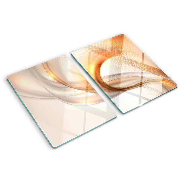 Tagliere in vetro temperato con motivi a onde in tonalità oro