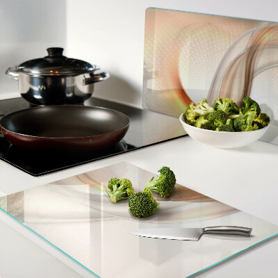 Tagliere in vetro temperato con motivi a onde in tonalità oro