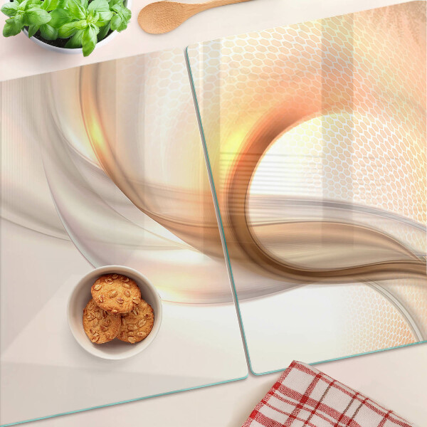 Tagliere in vetro temperato con motivi a onde in tonalità oro