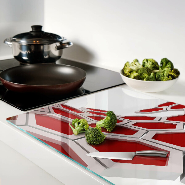 Tagliere in vetro temperato con motivo esagonale nei toni del rosso