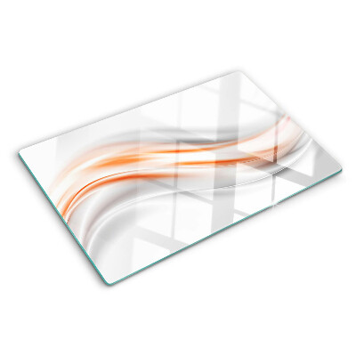 Tagliere in vetro con motivo a onde nei toni dell'arancione e del grigio