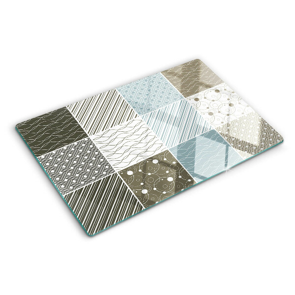 Tagliere in vetro con motivi geometrici e decorazioni a linee