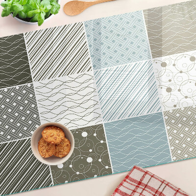 Tagliere in vetro con motivi geometrici e decorazioni a linee