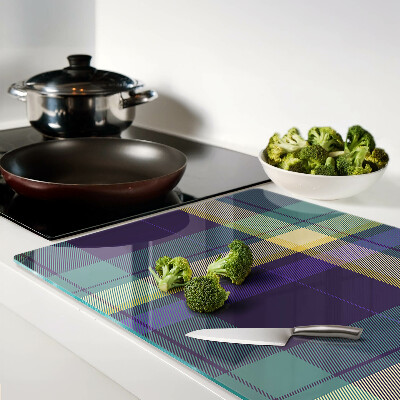 Tagliere in vetro con motivo a quadretti nei toni del viola e del verde