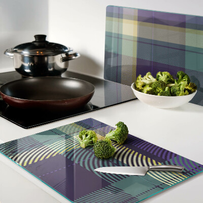 Tagliere in vetro con motivo a quadretti nei toni del viola e del verde