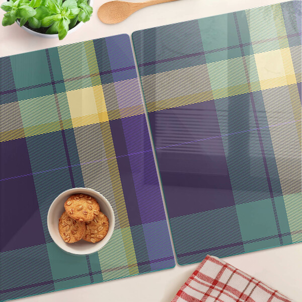 Tagliere in vetro con motivo a quadretti nei toni del viola e del verde