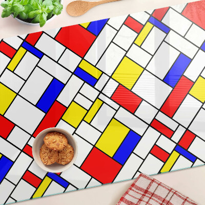 Tagliere in vetro temperato con decorazione geometrica ispirata a Mondrian