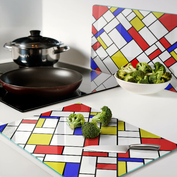 Tagliere in vetro temperato con decorazione geometrica ispirata a Mondrian