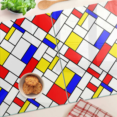 Tagliere in vetro temperato con decorazione geometrica ispirata a Mondrian