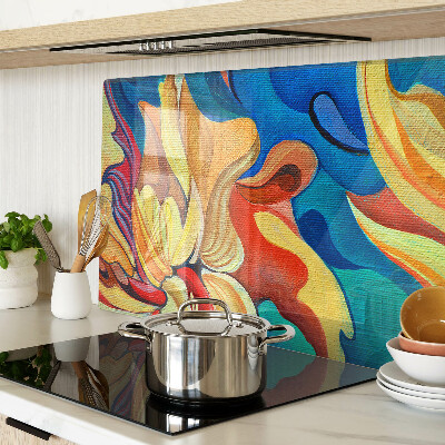 Tagliere in vetro temperato con fiori colorati su uno sfondo astratto