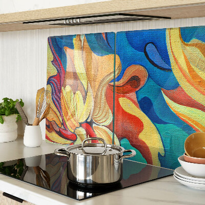 Tagliere in vetro temperato con fiori colorati su uno sfondo astratto