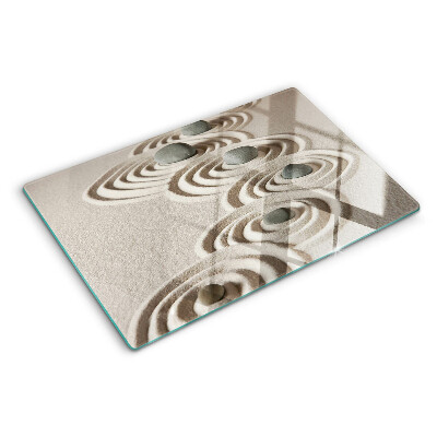 Tagliere in vetro con motivi ondulati ispirati alla sabbia