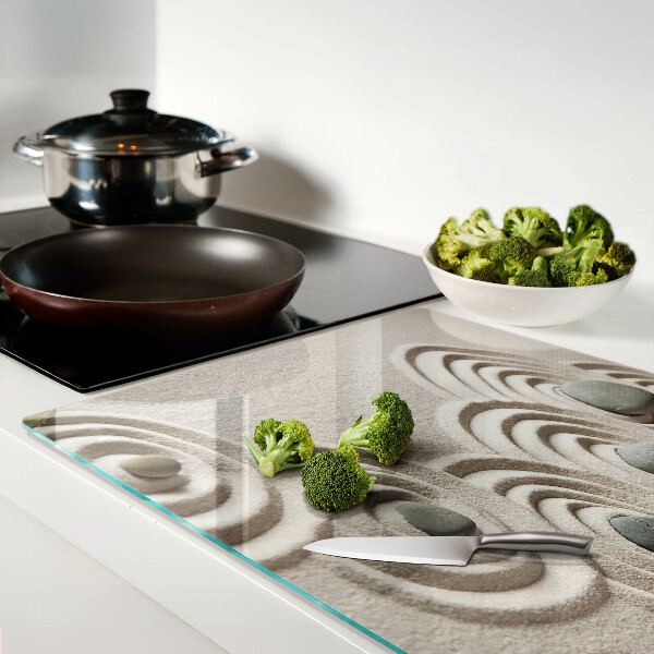 Tagliere in vetro con motivi ondulati ispirati alla sabbia