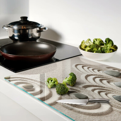 Tagliere in vetro con motivi ondulati ispirati alla sabbia